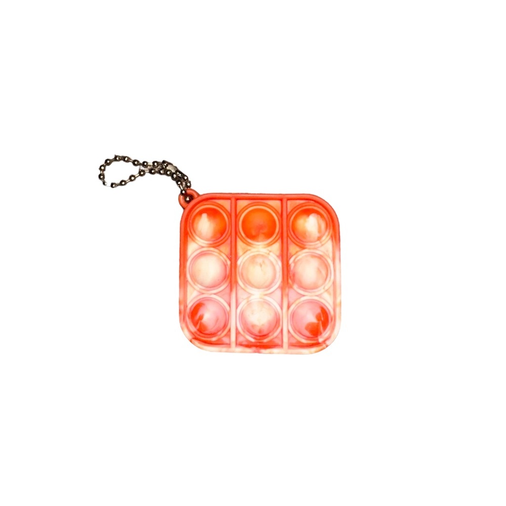 NWOT ORANGE SWIRL SENSORY POP-IT KEY CHAIN